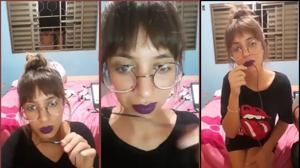 Garota jovem de origem humilde fazendo strip na transmissão ao vivo para agradar os homens