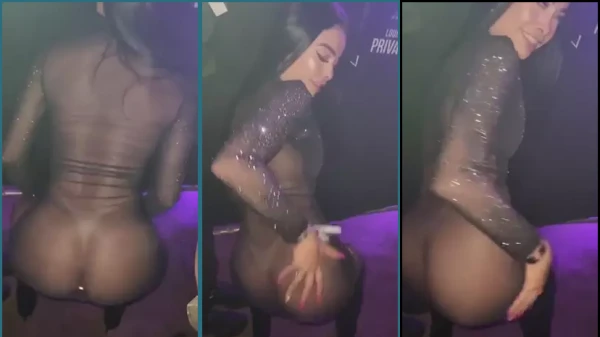 Xgisa está na festa com uma roupa ousada e dançando de forma sensual